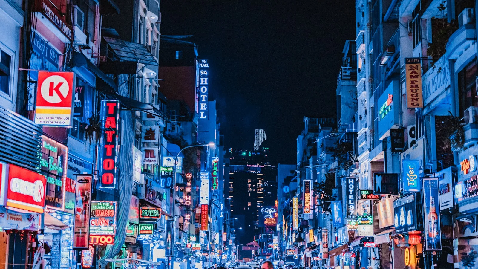 A neon-lit street in Ho Chi Minh City